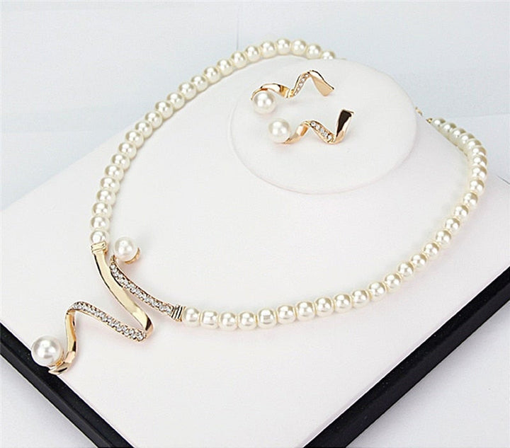 Natuurlijke parels ketting + set oorbellen
