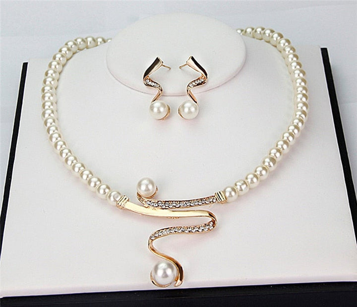 Natuurlijke parels ketting + set oorbellen
