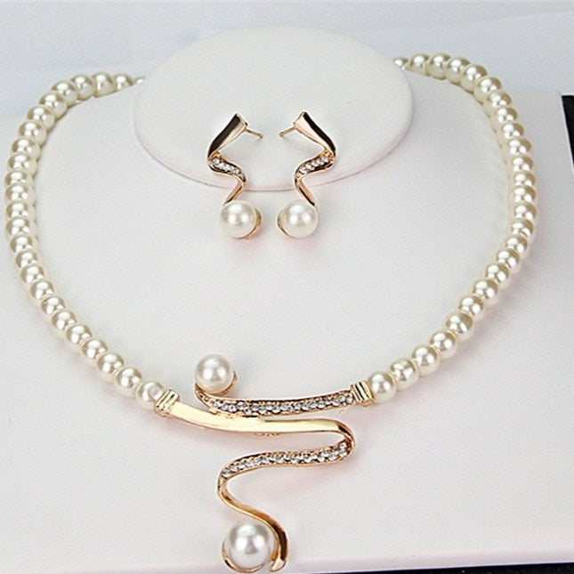 Natuurlijke parels ketting + set oorbellen